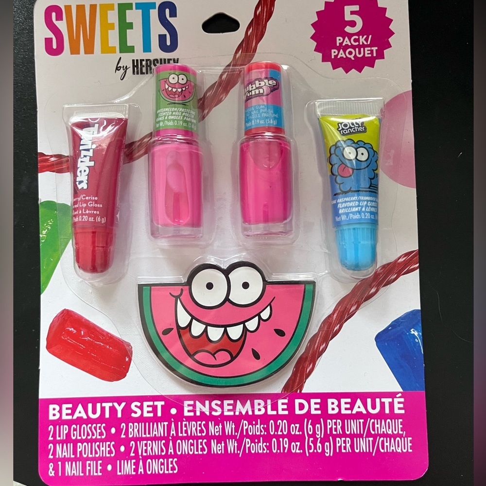 Nail polish, lip gloss and nail file pack
